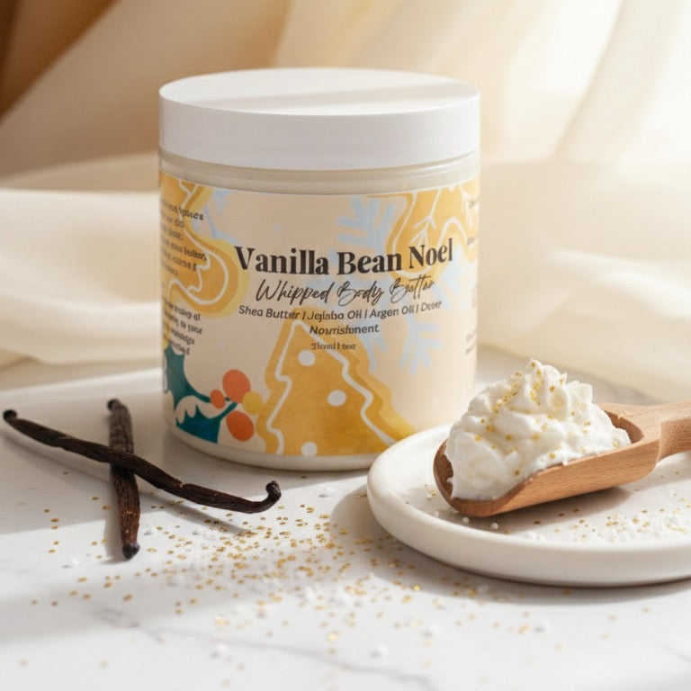 Jar of Vanilla Bean Nocci whipped body butter with a scoop and vanilla beans on a light background