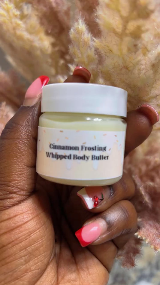 Small jar of NoùNoù Beauty Cinnamon Frosting Body Butter in sampler size, creamy whipped texture inside the jar.”